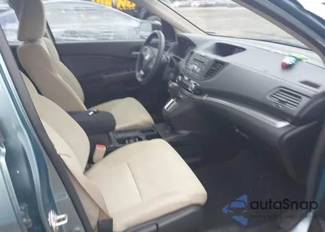 2015 Honda Cr-V Lx z USA, uszkodzony, nr VIN 2HKRM4H35FH690874